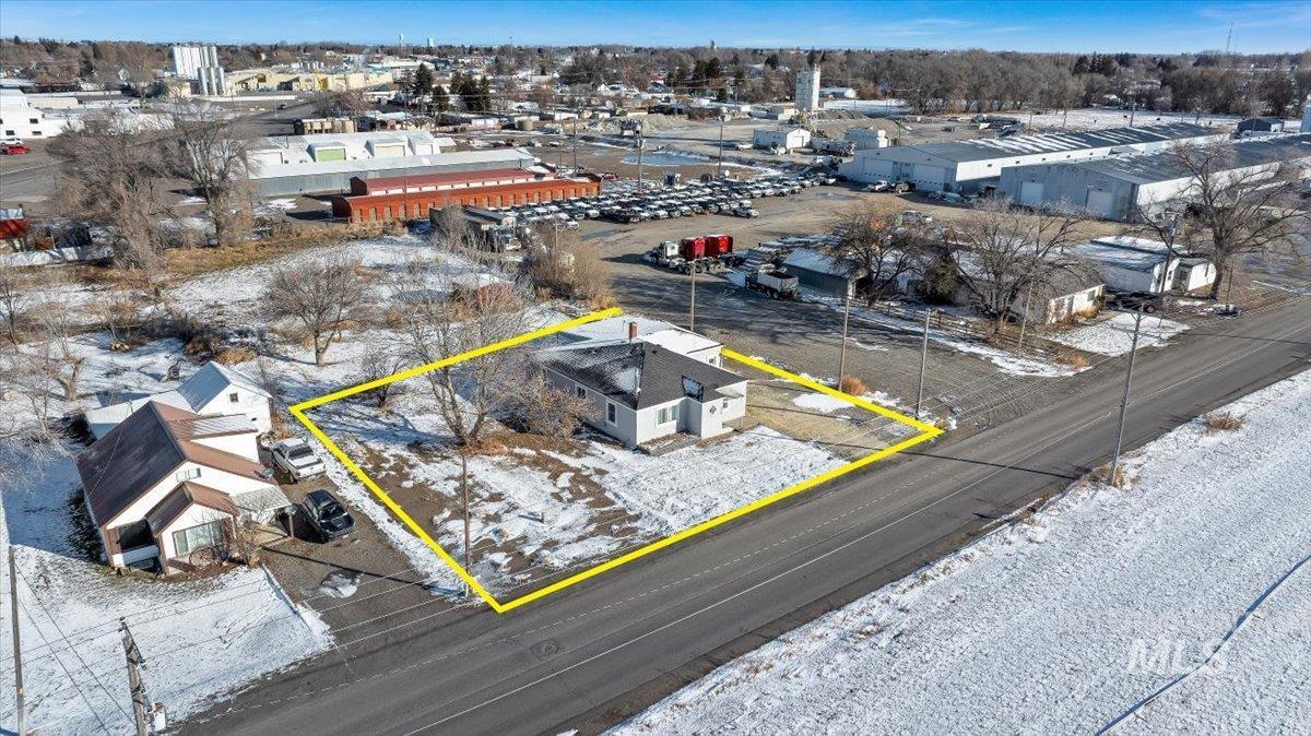 810 South 9th Street Rupert, ID 83350 - Photo 27 of 31 Snowy aerial view featuring property boundaries highlighted
