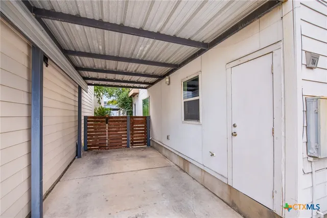 a view of outdoor space with wooden walls