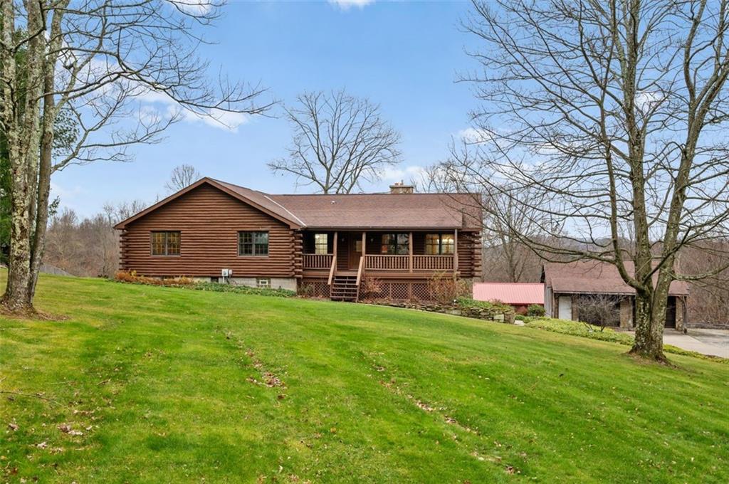 5150 Beech Road Apollo, PA 15613 - Photo 33 of 37 a front view of house with yard and green space