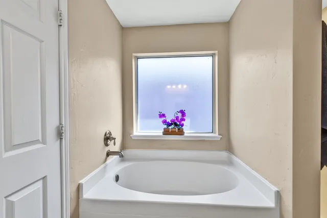 a bathroom with a tub