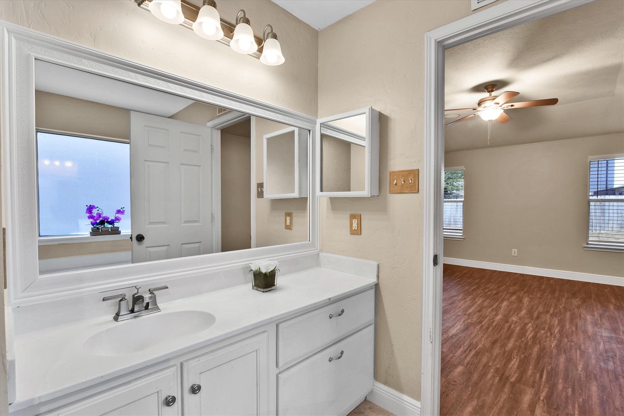 914 Ivycroft Lane Spring, TX 77373 - Photo 13 of 21 The vanity with medicine cabinet and framed mirror.