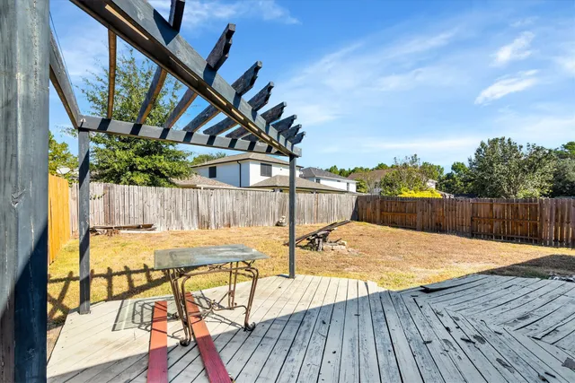a view of swimming pool with chairs