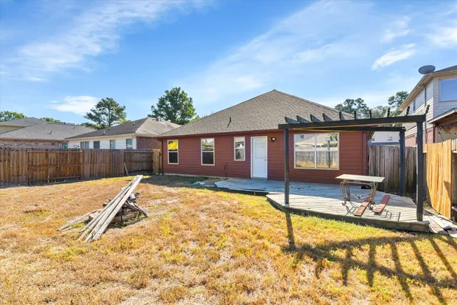 a house with trees in the background