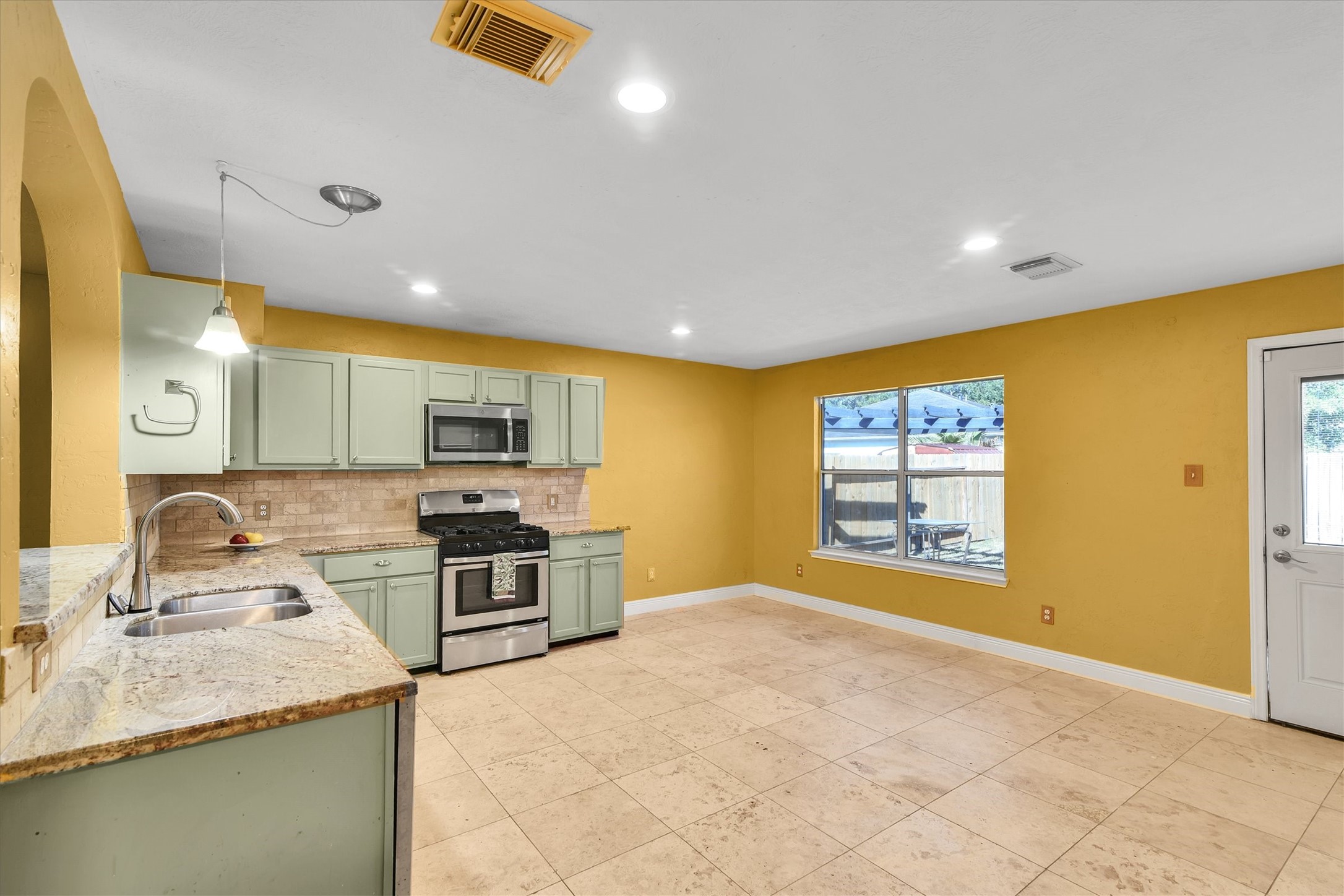 914 Ivycroft Lane Spring, TX 77373 - Photo 5 of 21 The kitchen is open and spacious, with room for an eating area.