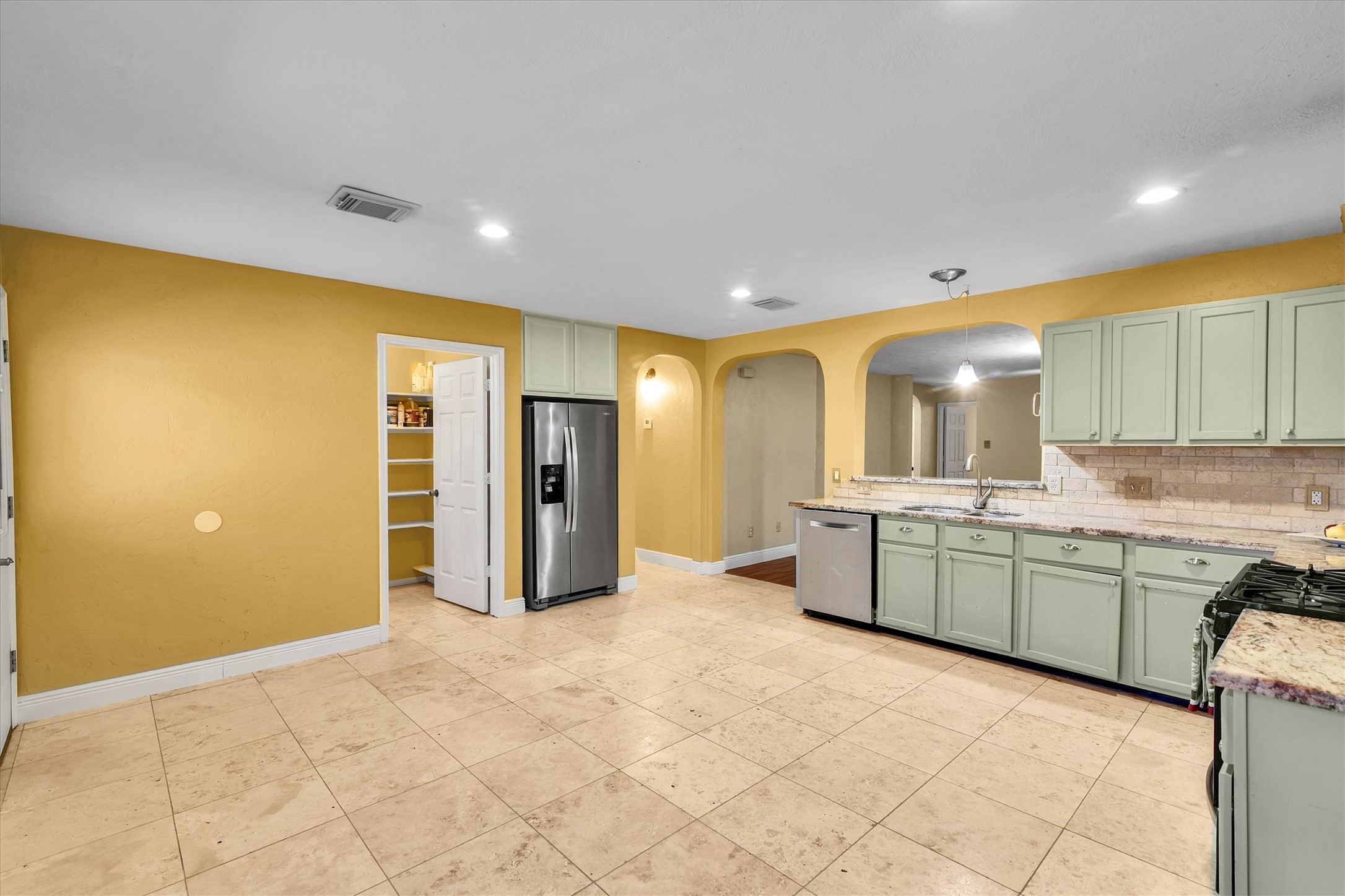 914 Ivycroft Lane Spring, TX 77373 - Photo 7 of 21 The kitchen has an oven, microwave, and comes with a refrigerator.