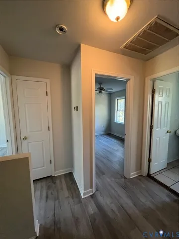 a view of a livingroom with wooden floor