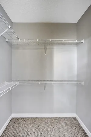 a view of a room with racks on the wall
