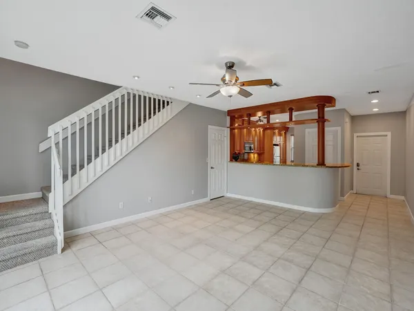 a view of entryway and hall with a window