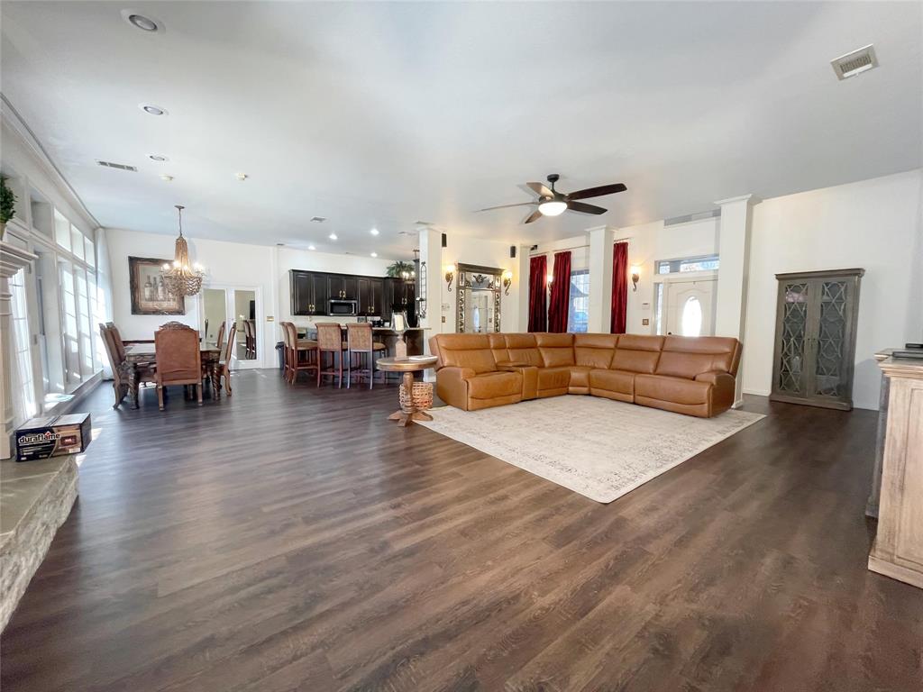 286 West Ridge Street Decatur, TX 76234 - Photo 12 of 35 a living room with furniture and a wooden floor