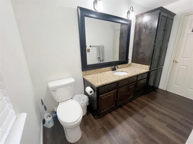 a bed room with a bed and a chandelier