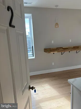 a bathroom with a toilet and a bathtub