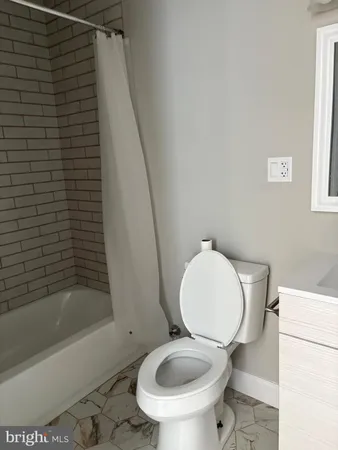a view of a bathroom with a sink and toilet