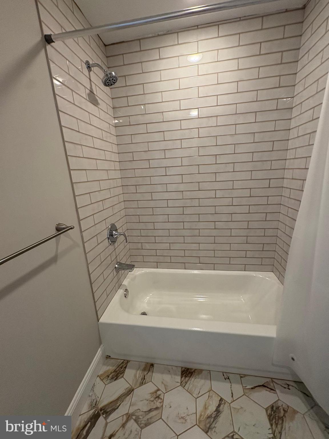 2900 North 5th Street, Unit 2 Philadelphia, PA 19133 - Photo 5 of 8 a bathroom with a bathtub and shower