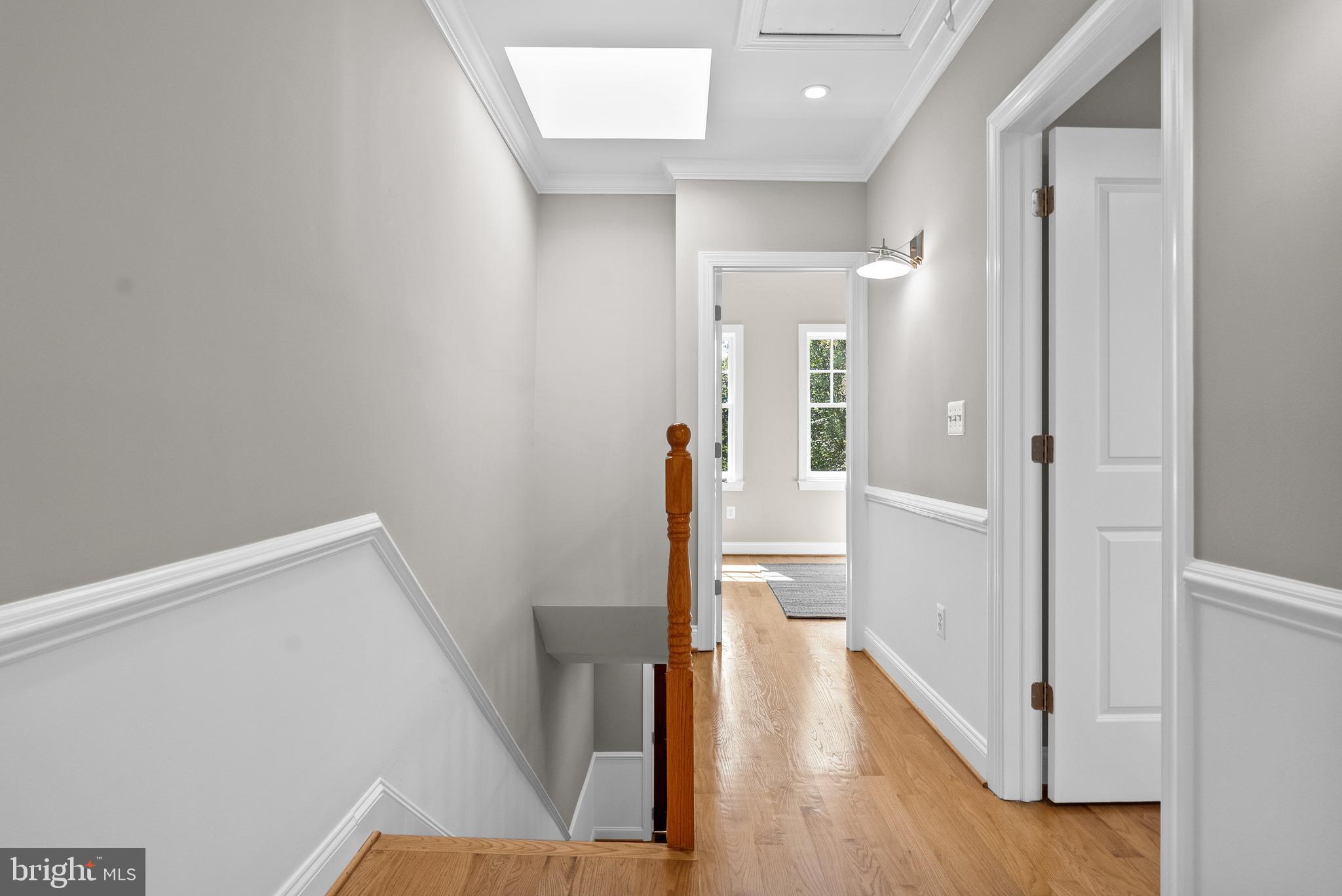 610 Independence Avenue Southeast Washington, DC 20003 - Photo 11 of 26 a view of a hallway with wooden floor and staircase