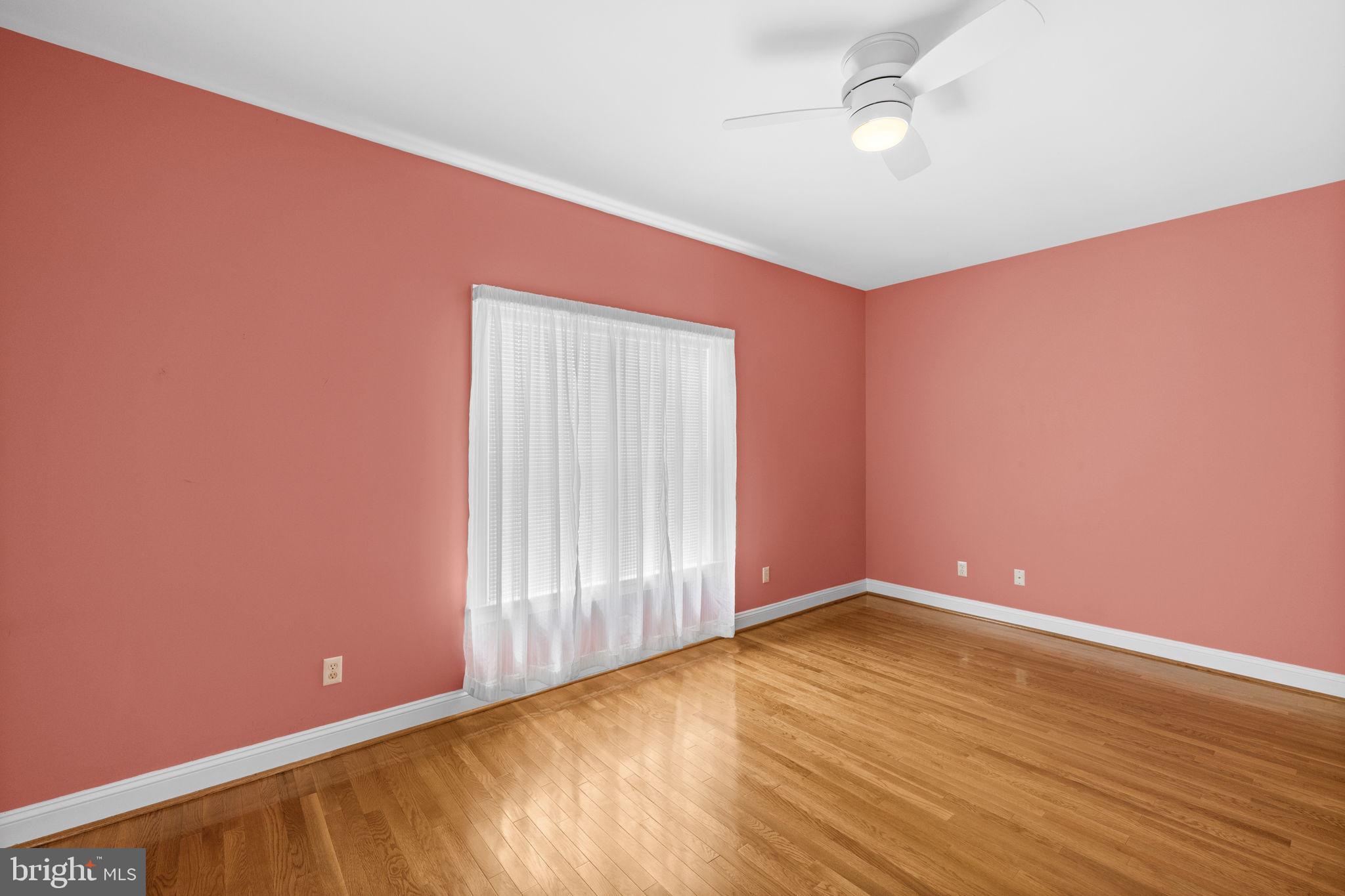 621 Country Club Road Culpeper, VA 22701 - Photo 30 of 45 Charming pink-hued room with light.