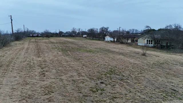 a view of a town with palm trees