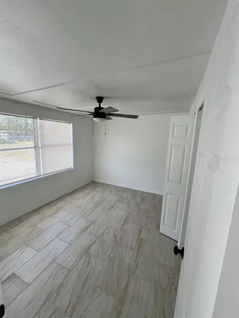 an empty room with windows