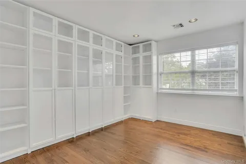 a workspace with furniture and a window