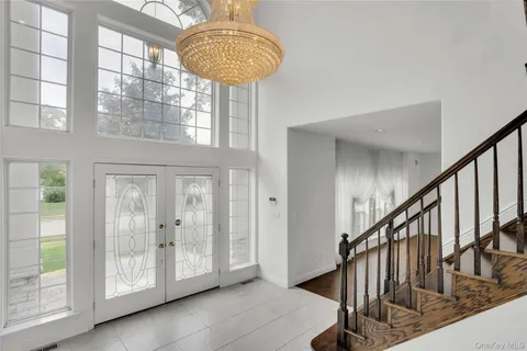 a view of lobby with chandelier