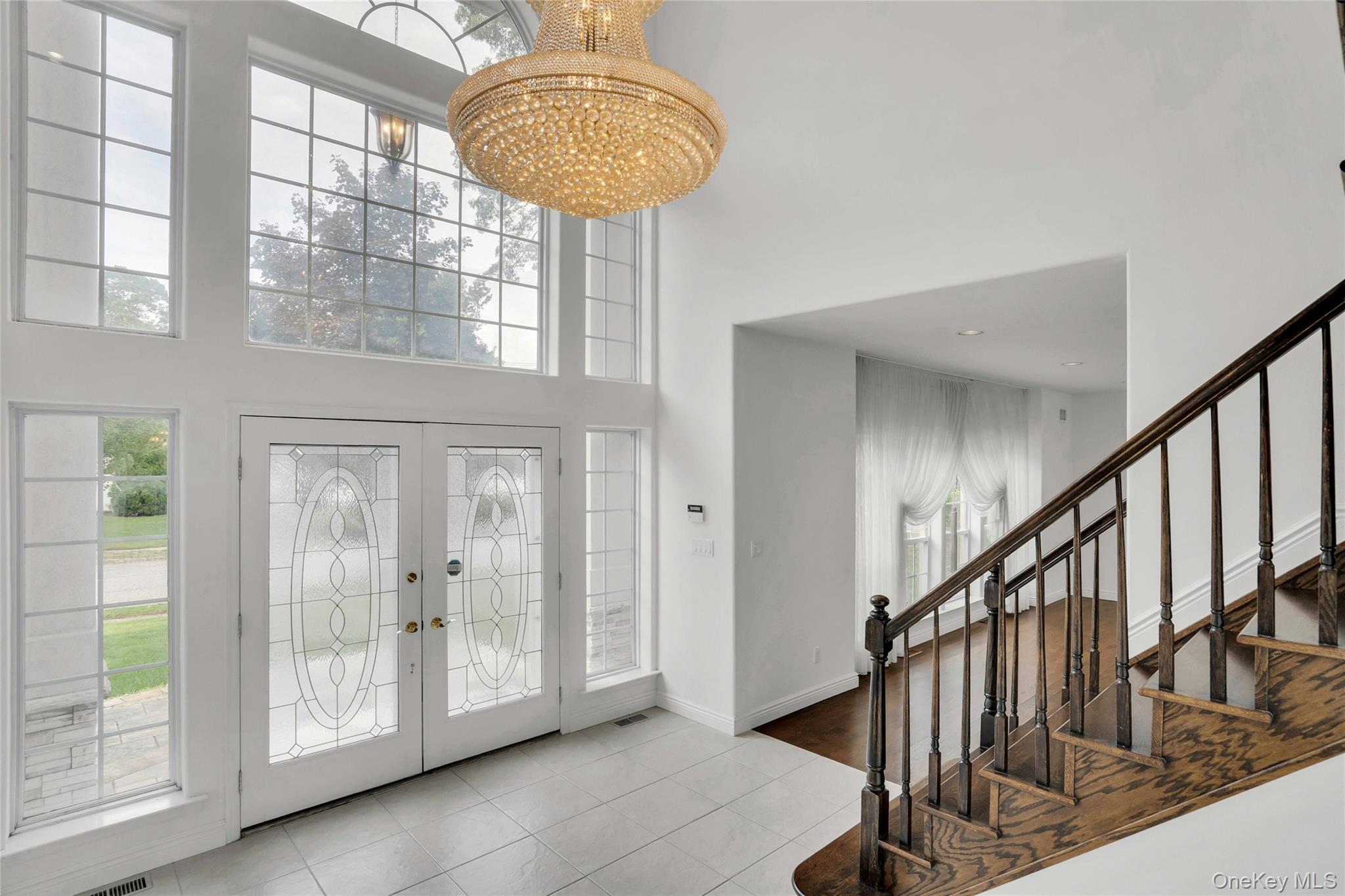 2 Wisteria Lane Lake Grove, NY 11755 - Photo 3 of 43 a view of lobby with chandelier