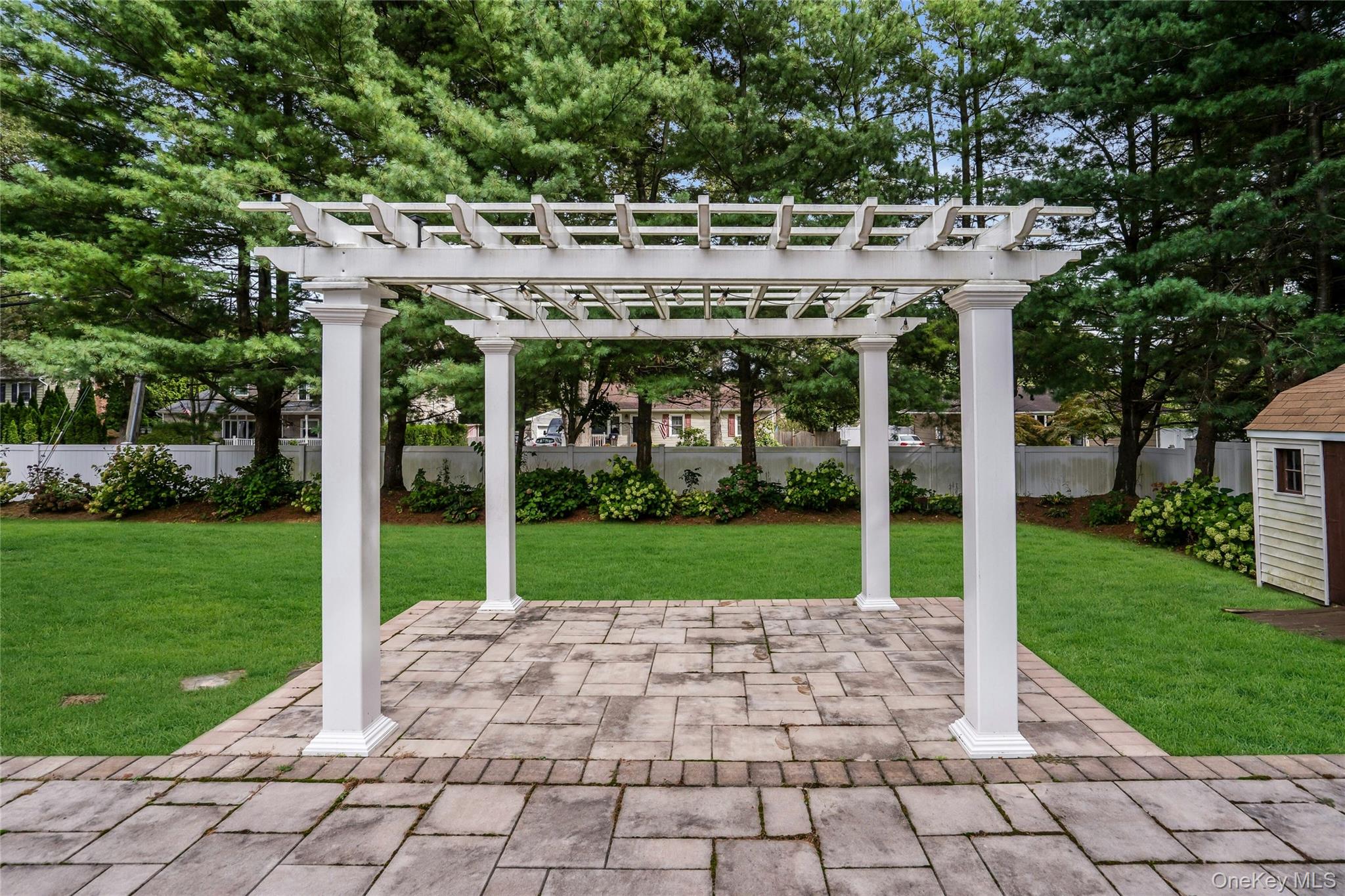 2 Wisteria Lane Lake Grove, NY 11755 - Photo 39 of 43 a view of a house with garden