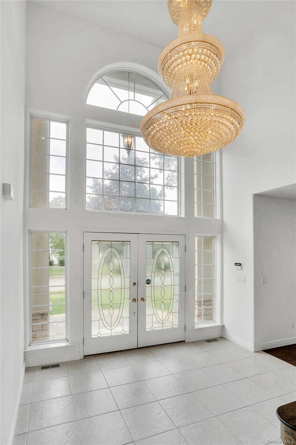 2 Wisteria Lane Lake Grove, NY 11755 - Photo 4 of 43 a view of entryway with chandelier