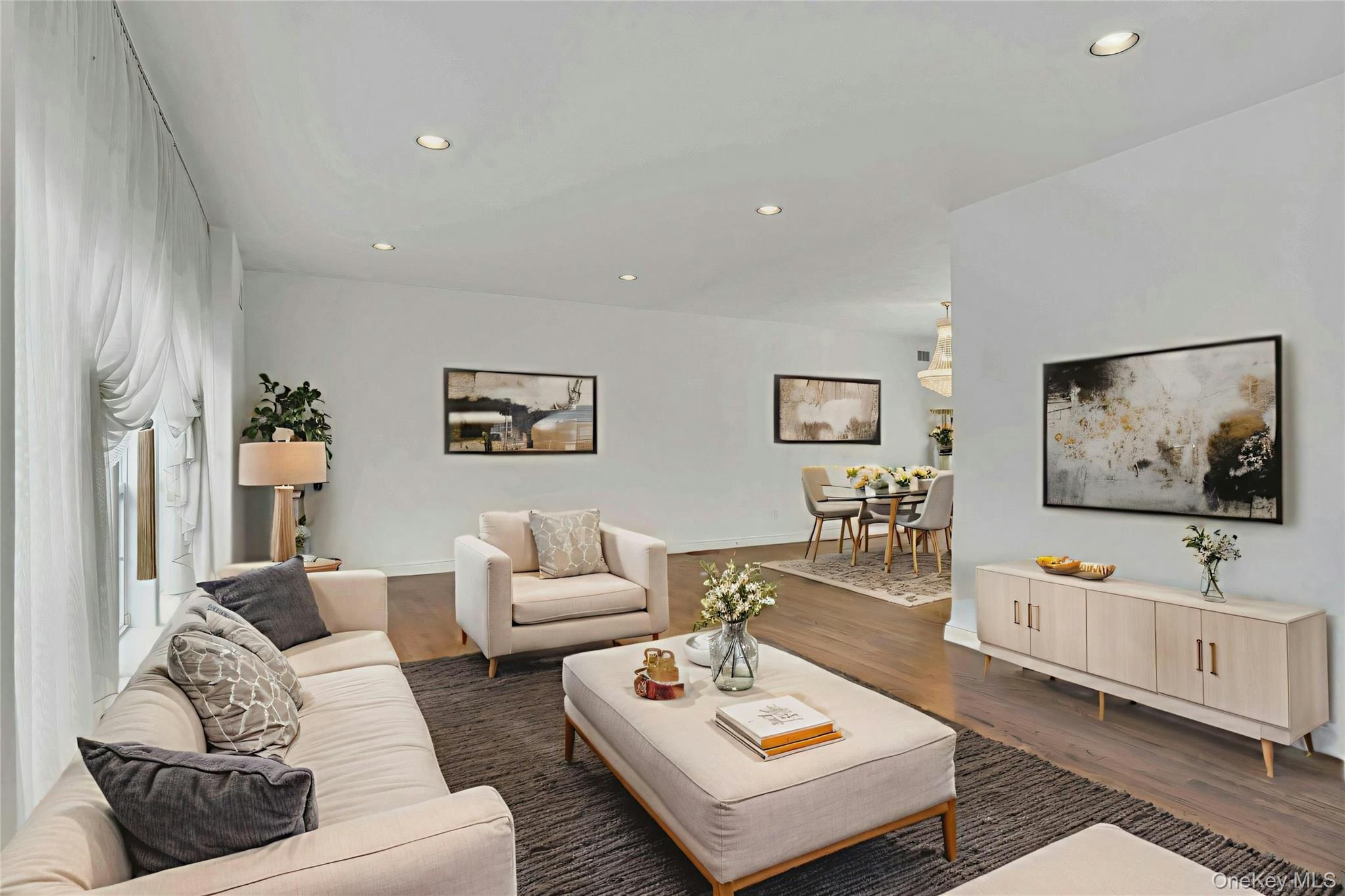 2 Wisteria Lane Lake Grove, NY 11755 - Photo 6 of 43 a living room with furniture and a flat screen tv