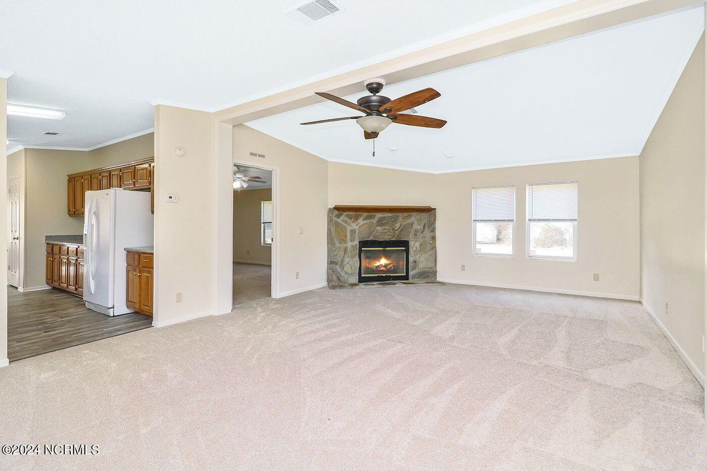 202 Maple Road Currituck, NC 27929 - Photo 2 of 26 Have to hook Propane up but here is what the Fireplace could look like if it was lite on a Cold day.