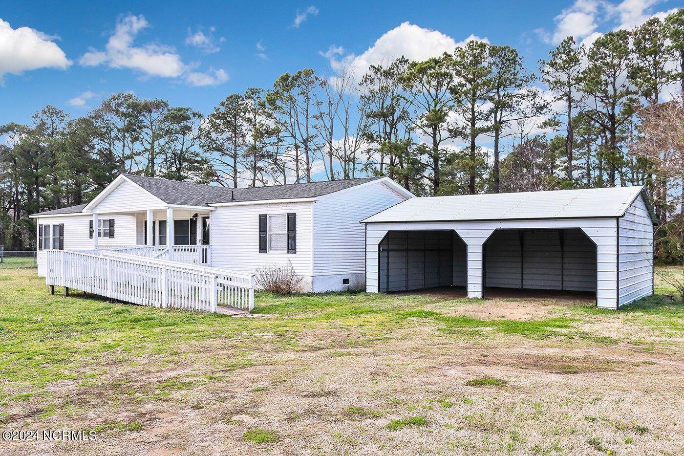 202 Maple Road Currituck, NC 27929 - Photo 25 of 26 View of the Carport and Ramp to Home