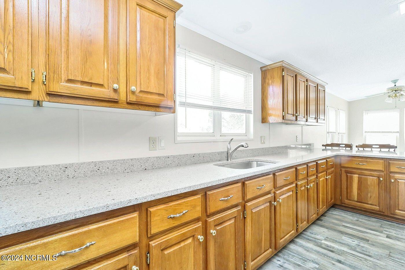 202 Maple Road Currituck, NC 27929 - Photo 7 of 26 New Granite & New LVP