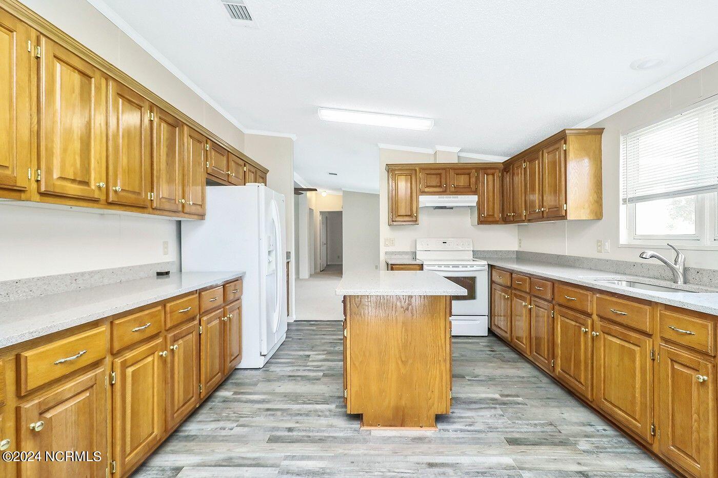 202 Maple Road Currituck, NC 27929 - Photo 8 of 26 New Granite & New LVP