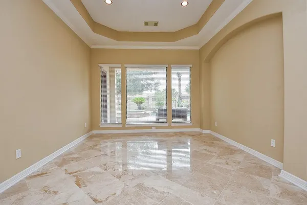 an empty room with windows