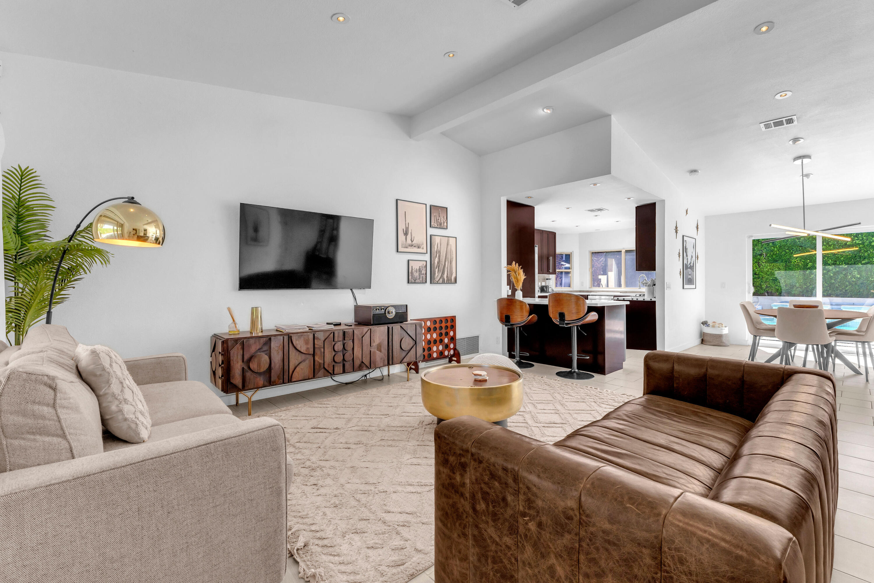 2355 West Nicola Road Palm Springs, CA 92262 - Photo 14 of 54 a living room with furniture and a flat screen tv
