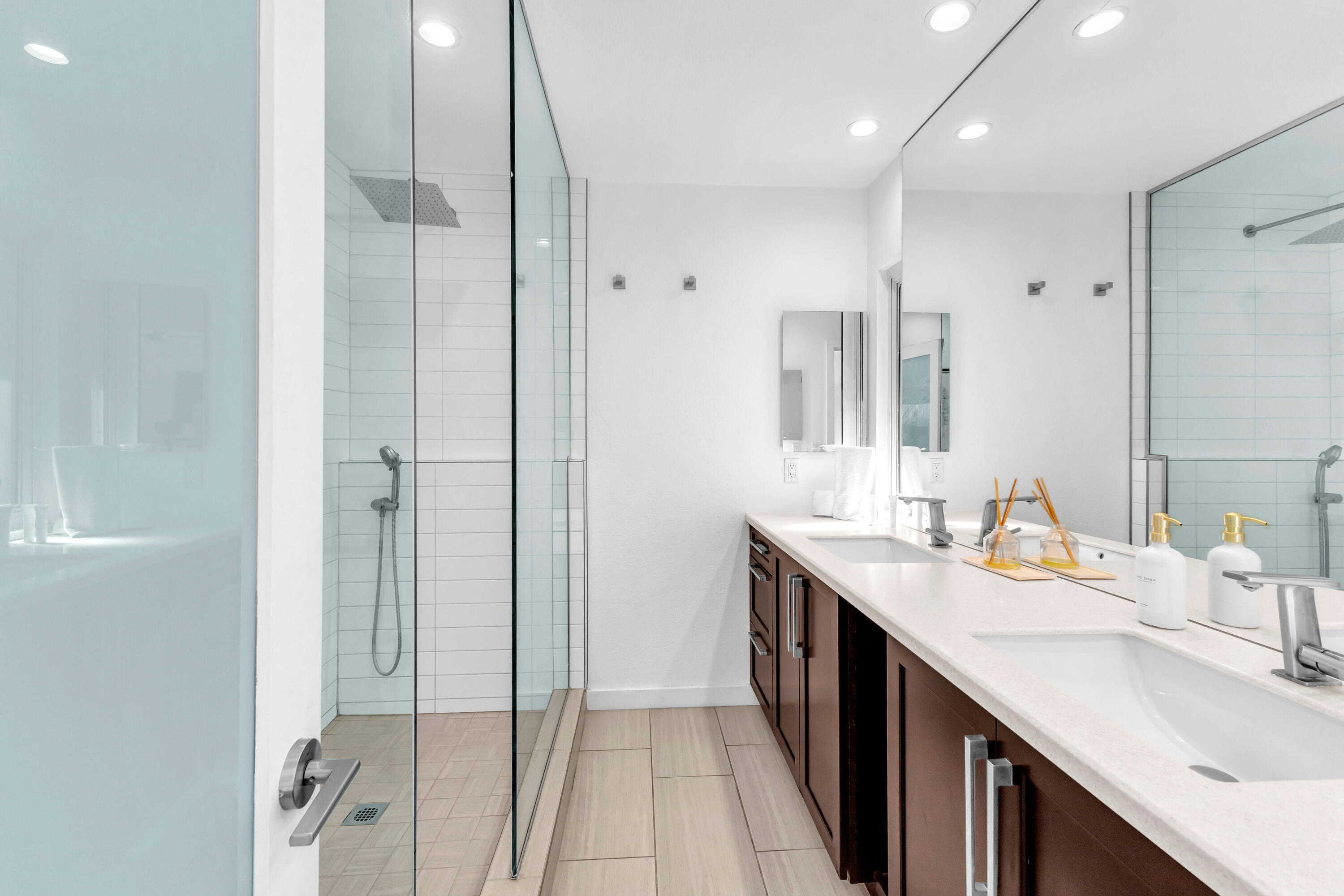2355 West Nicola Road Palm Springs, CA 92262 - Photo 42 of 54 a bathroom with a double vanity sink a mirror and a shower