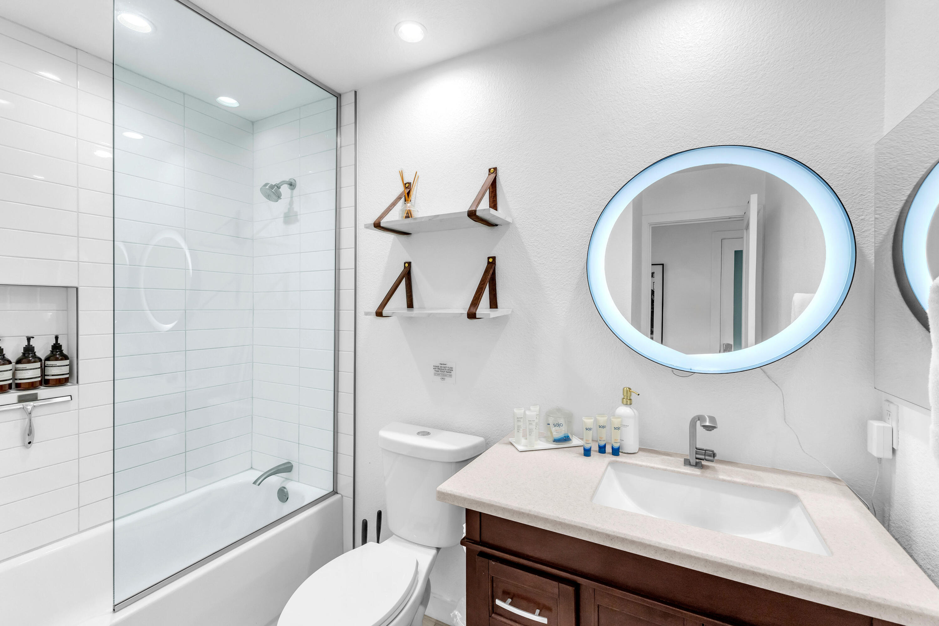 2355 West Nicola Road Palm Springs, CA 92262 - Photo 44 of 54 a bathroom with a sink a toilet and a mirror