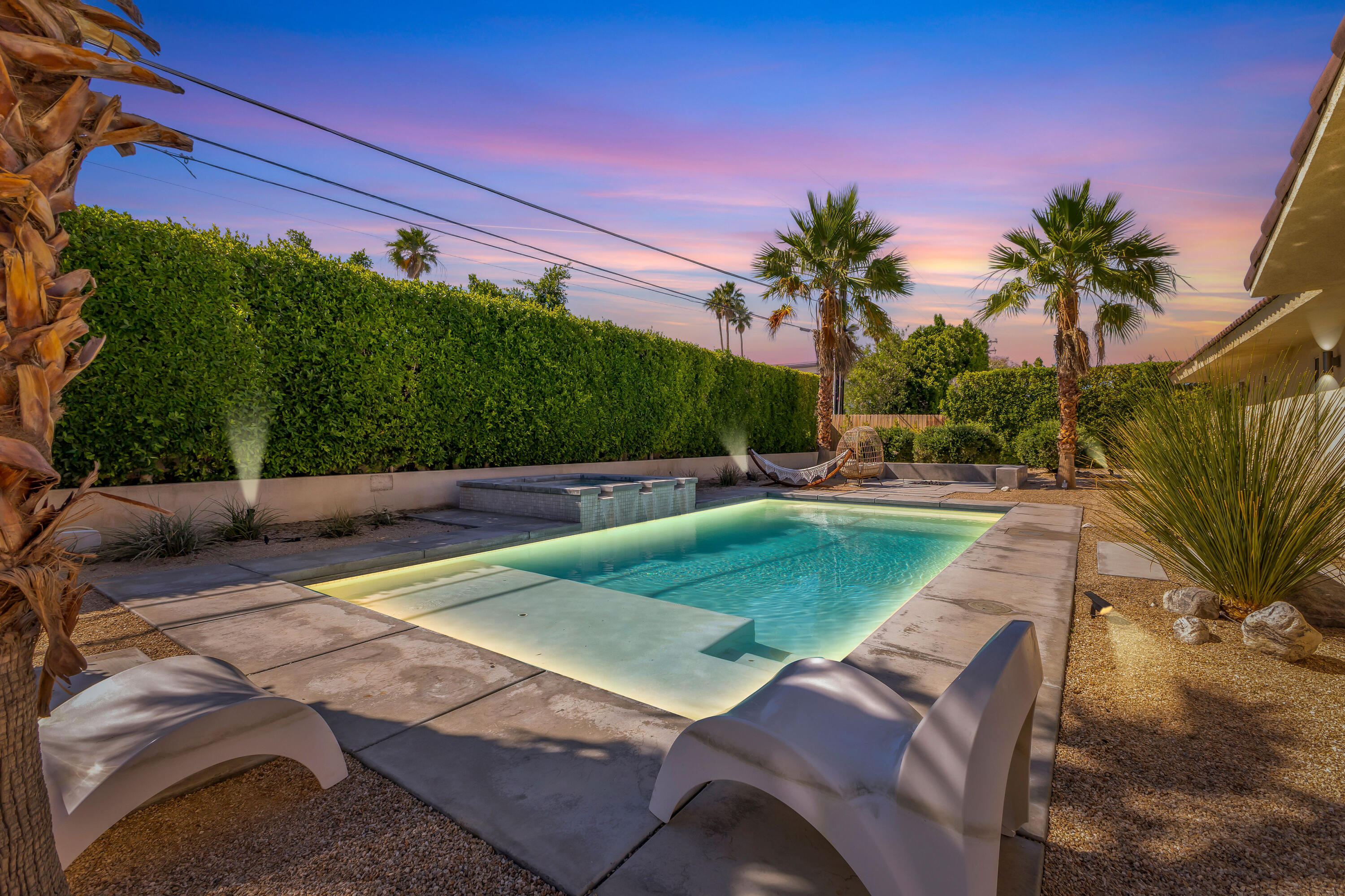 2355 West Nicola Road Palm Springs, CA 92262 - Photo 6 of 54 a view of a backyard with palm trees