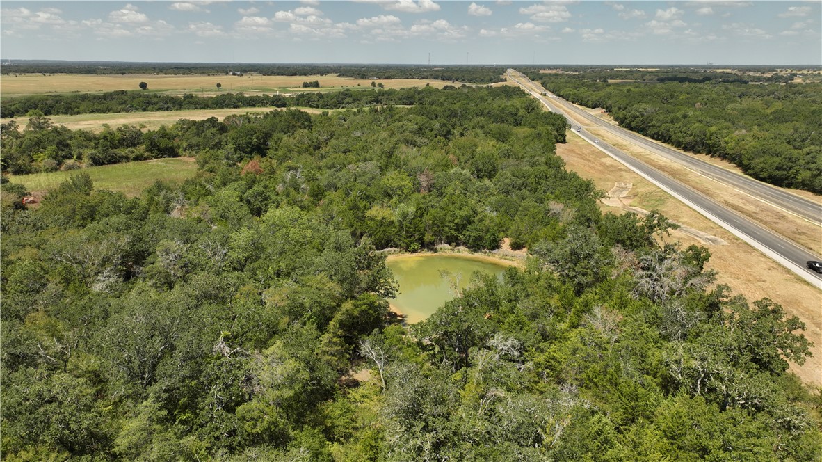 5131 North State Highway Hearne, TX 77859 - Photo 13 of 16 Drone / aerial view of a large body of water