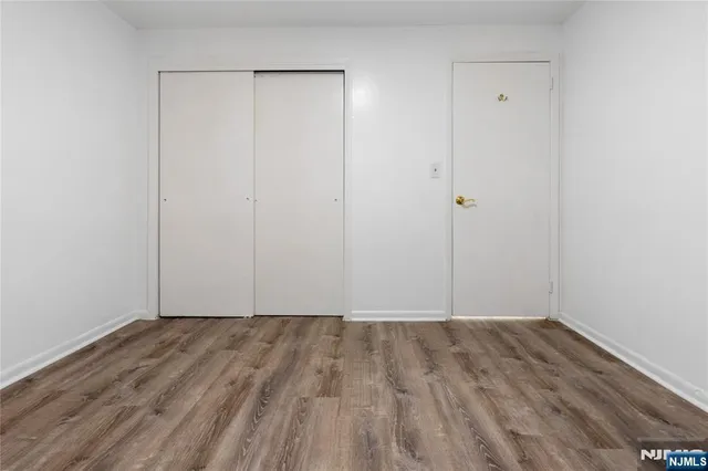 a view of small space with wooden floor