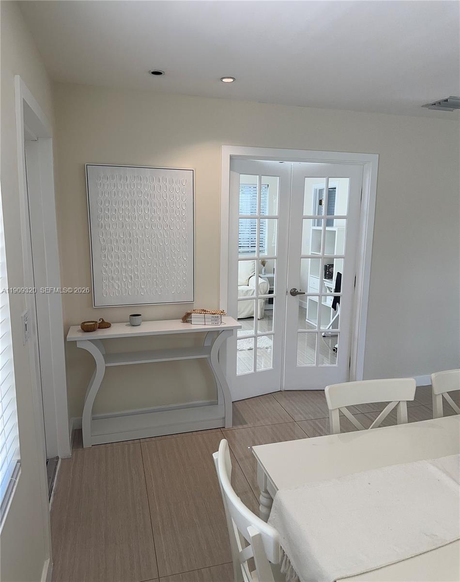 9464 Abbott Avenue Surfside, FL 33154 - Photo 36 of 37 a living room with furniture and view of kitchen