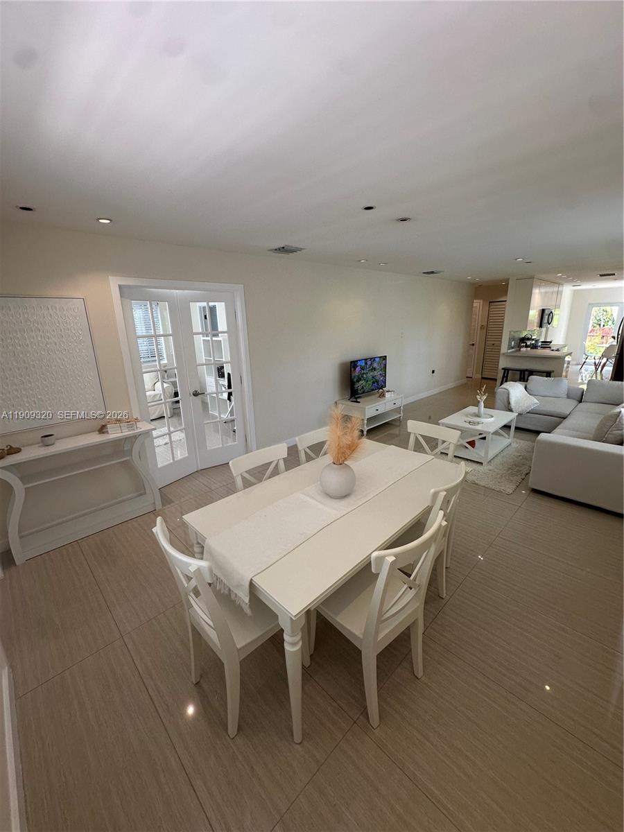 9464 Abbott Avenue Surfside, FL 33154 - Photo 37 of 37 a view of a dining room with furniture