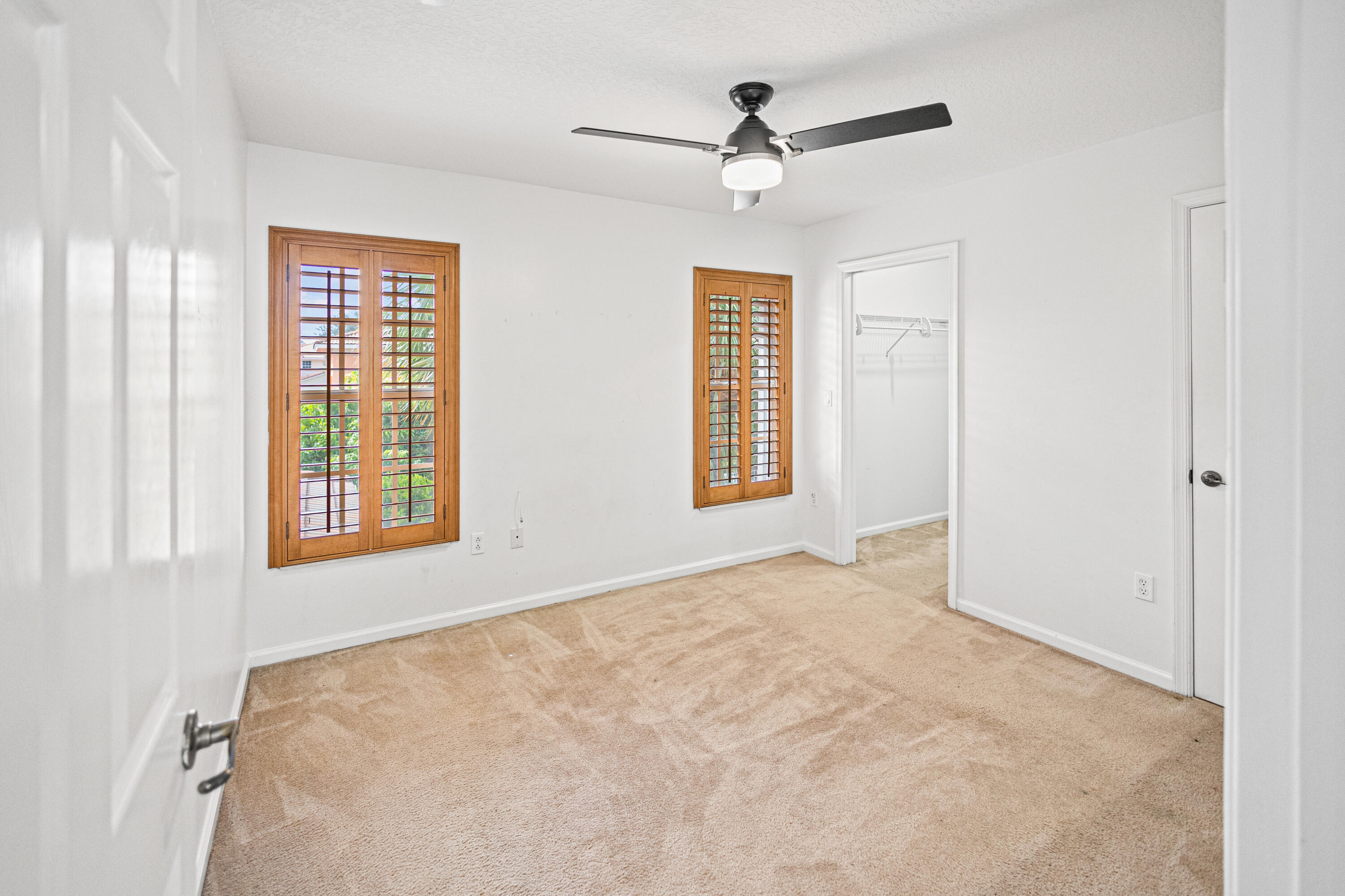 6684 Eagle Ridge Drive Greenacres, FL 33413 - Photo 11 of 27 a view of an empty room with a window