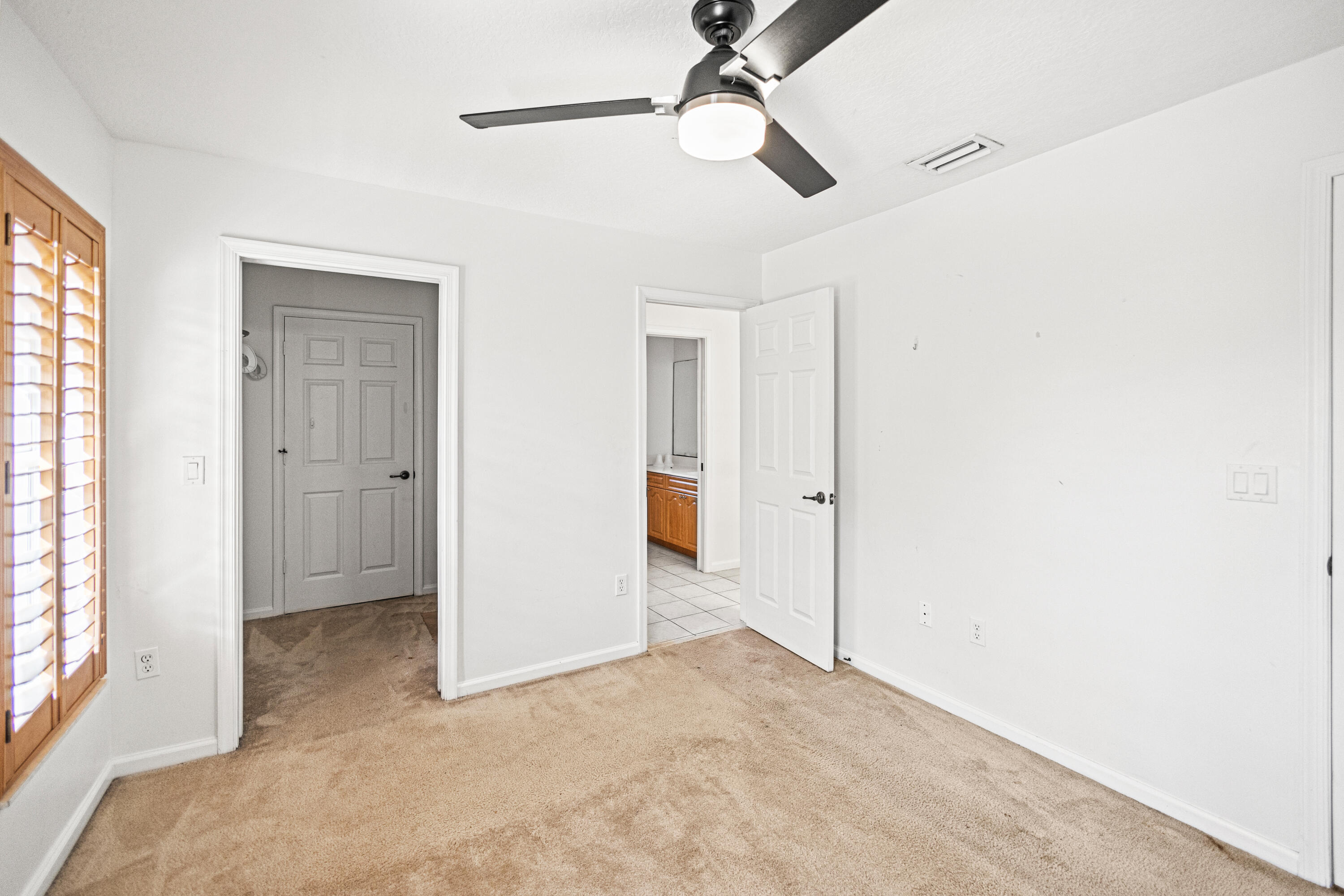 6684 Eagle Ridge Drive Greenacres, FL 33413 - Photo 14 of 27 a view of empty room with a window