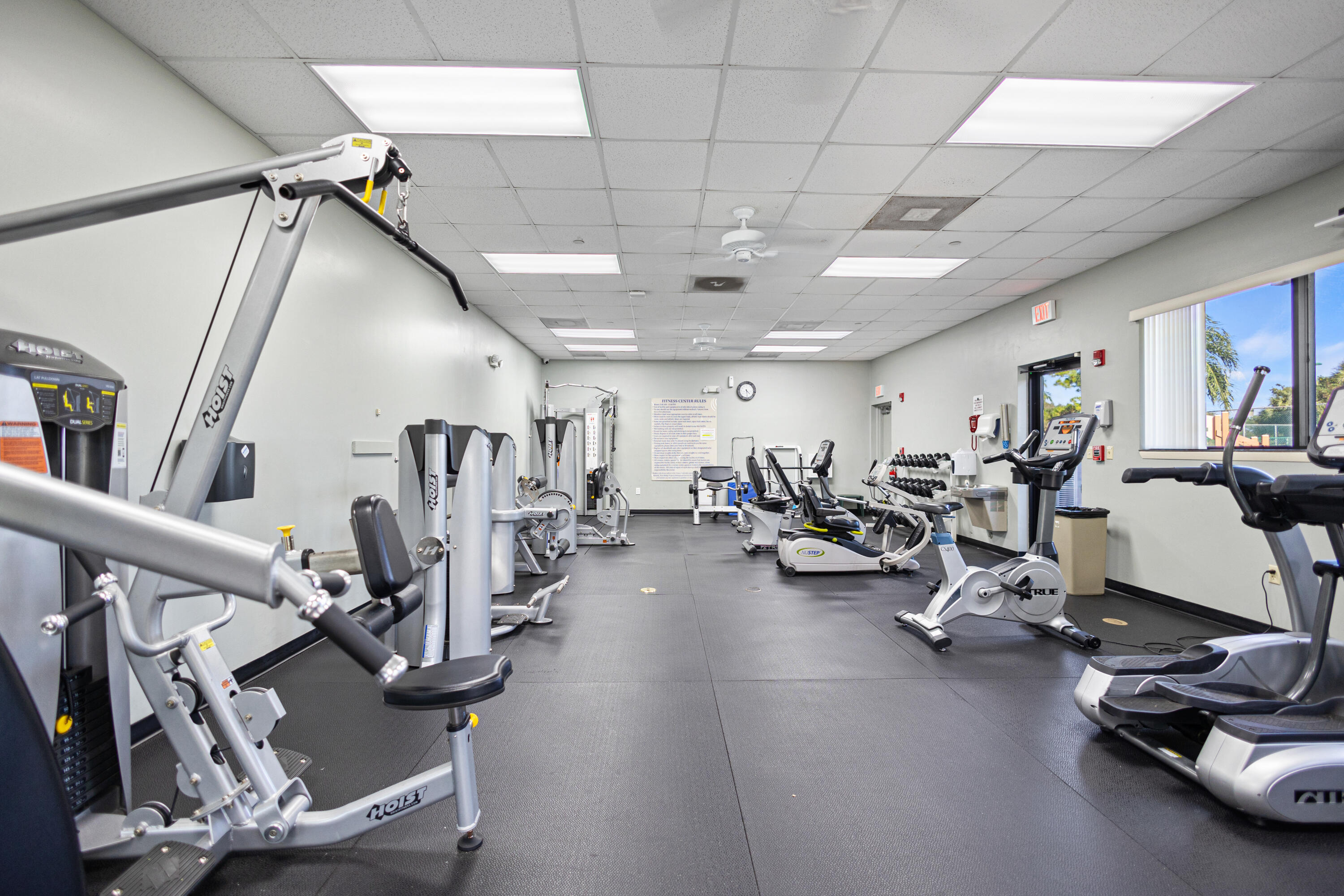 6684 Eagle Ridge Drive Greenacres, FL 33413 - Photo 27 of 27 a view of a room with gym equipment