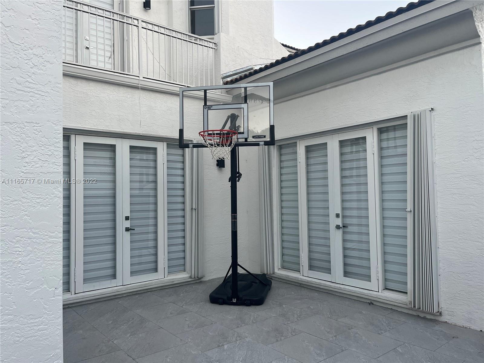 Doral Isles Doral, FL 33178 - Photo 31 of 37 a view of a livingroom with a staircase