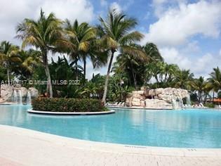 Doral Isles Doral, FL 33178 - Photo 35 of 37 a view of a backyard with swimming pool