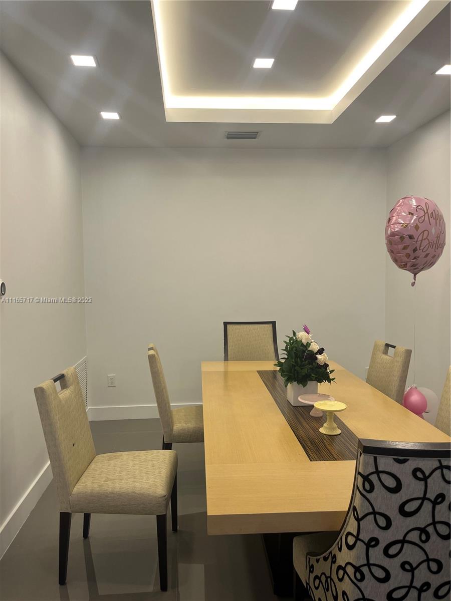 Doral Isles Doral, FL 33178 - Photo 7 of 37 a view of a dining room with furniture