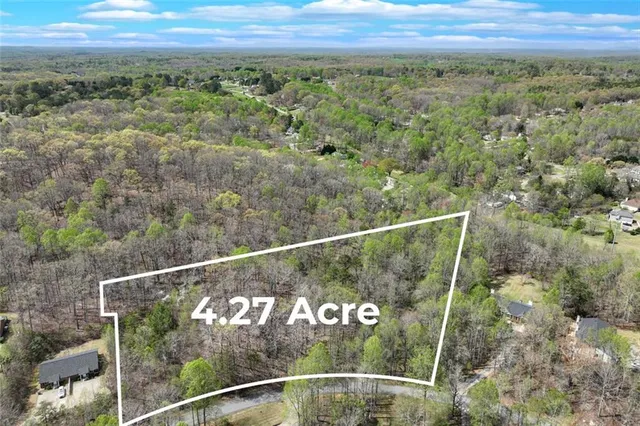 a view of city and green space