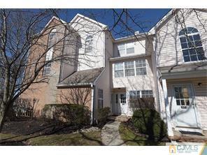 1407 Plymouth Road North Brunswick, NJ 08902 - Photo 1 of 2 a view of a house with a yard and balcony