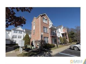 1407 Plymouth Road North Brunswick, NJ 08902 - Photo 2 of 2 a view of a street with a building in front of it