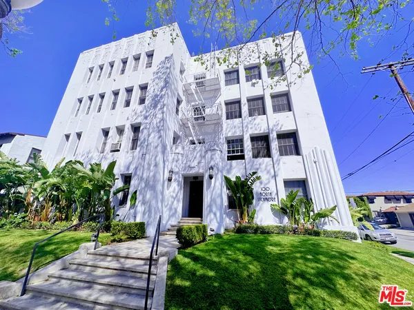 a view of a building with garden